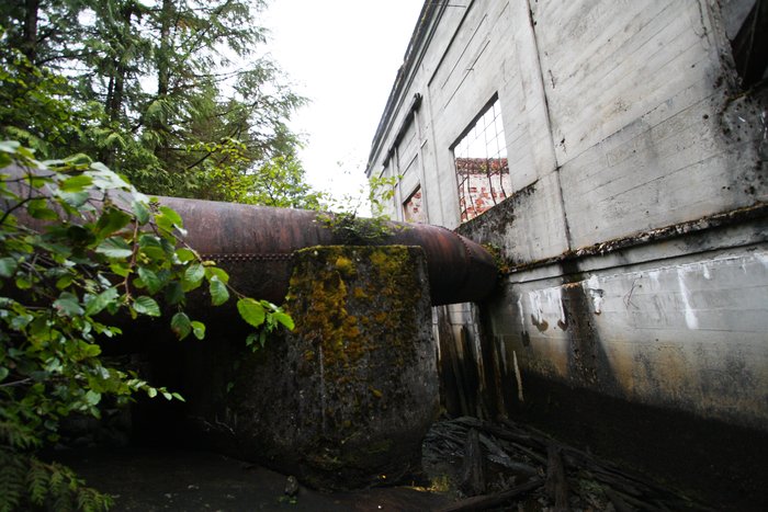 This large pipe may have been used to run water to mine equipment in this building.  It's long-abandoned and non-functional.