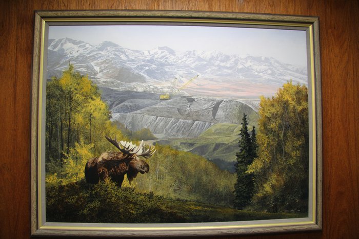 In the <a href="http://www.groundtruthtrekking.org/Issues/AlaskaCoal/UsibelliCoalMine.html">Usibelli Coal Mine Inc.</a> offices this painting depicting a majestic vista of coal mining in Alaska is prominently displayed.
