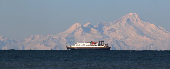 The state ferry passes in front of Mt. Iliamna on its way to Seldovia
