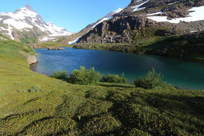 Alpine lake in the tundra playground in upper Tutka