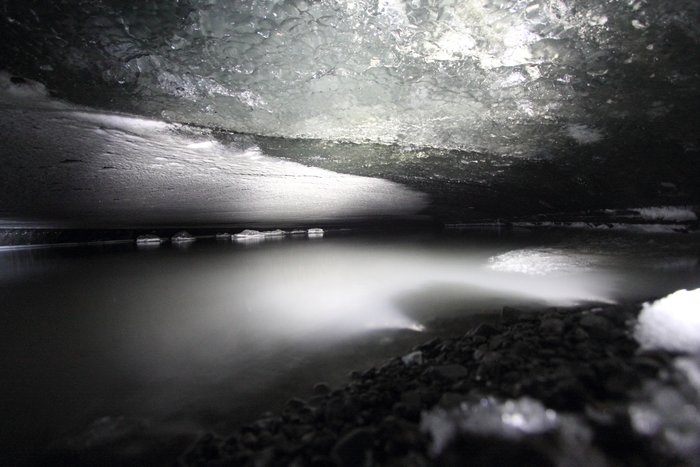 Being in this flat-roofed ice tunnel was like we were exploring the bottom of the glacier.  I expect though that there was ice below us too, and we were really in the middle of the shifting ice.
