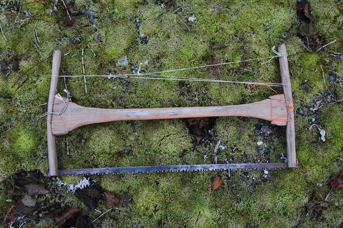 The blade was light and slipped nicely into a paddle shaft.  The handle I could build in the field, and leave behind when we wanted to ditch every ounce we could.