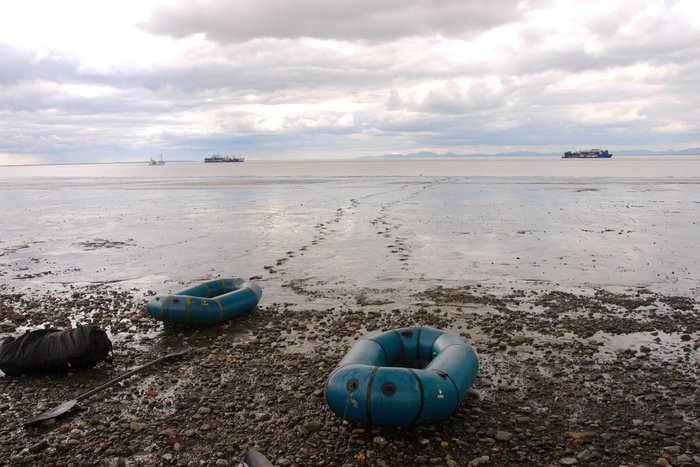 Alpacka rafts on the beach at Clark's Point, looking out across Nushagak Bay.