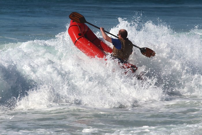 By taking advantage of the packrafts extreme buoyancy, one can get over the top of fairly large breaking waves.