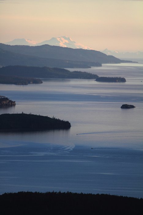 Two distant boats make their way into Halibut Cove in Kachemak Bay State Park.