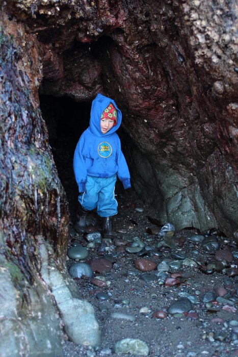 Katmai explores low tide caves at Naskowak Point