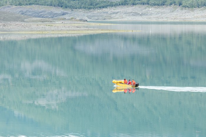 Colin Bloom drives passengers and equipment from camp to the head of Taan Fjord in a small skiff. Logistics for a multi-disciplined research expedition in remote Alaska are numerous and often complicated. 