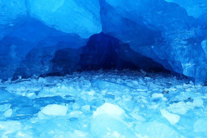Across shattered and refrozen ice is the entrance to a cave into the interior of Grewingk Glacier.