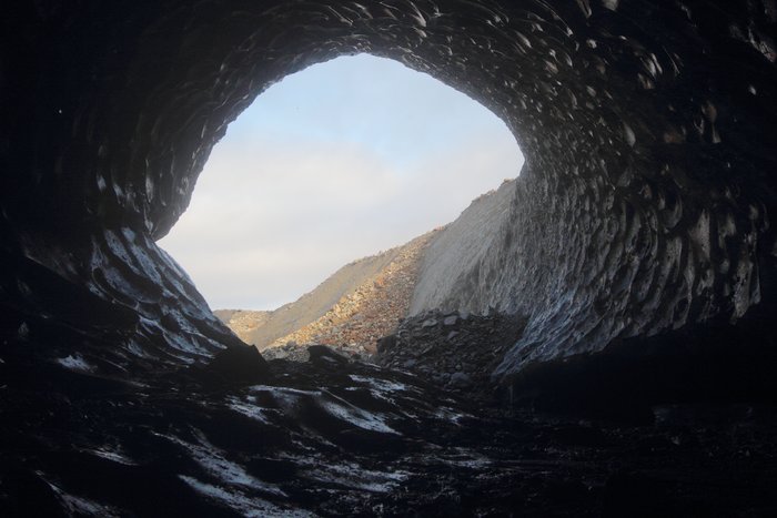 Warm air melted a small crevasse into a train-tunnel-sized cavity.