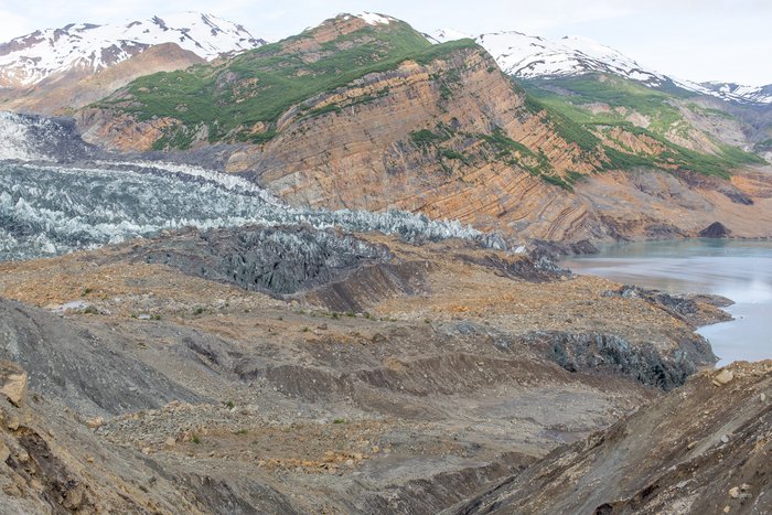 Standing in the middle of the landslide affords a tremendous view of an impossibly large event. This landslide occurred in October 2015. Some of the material slid onto the snout of the Tyndall Glacier but much of it landed in the fjord, which caused a massive tsunami. 