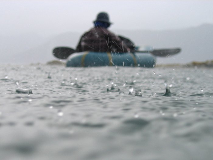 packraft in the rain in Prince William Sound