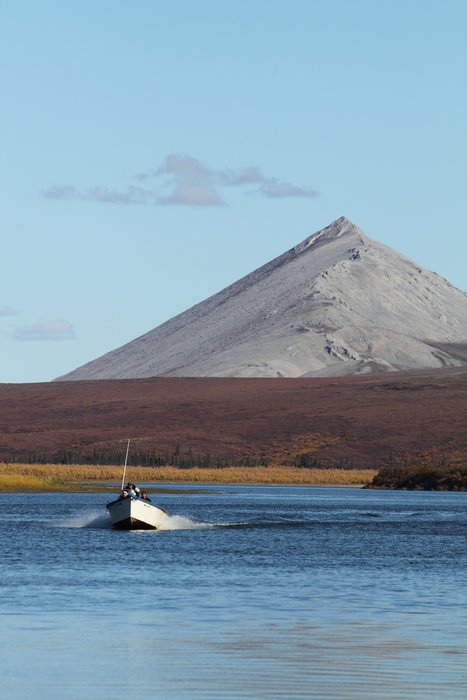 Skiffs travel up and down the Noatak River between Kotzebue and Noatak for transportation, looking for game, and carrying supplies.