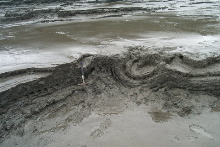 The silty sand of Turnagain is extremely vulnerable to liquefaction.  Ice floes, waves, and occasionally earthquakes lead to all manner of complex soft-sediment deformation.