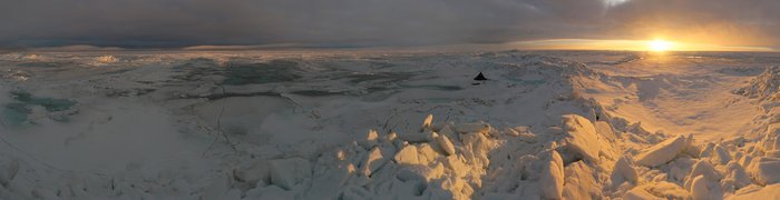 Our tiny tent hides behind giant ridges of broken ice on the Chukchi Sea.