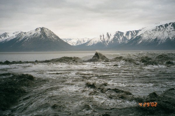 The rapidly rising tide on Turndagain Arm forms a tidal bore.