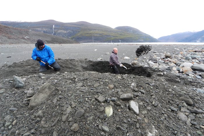 Geologists dig a trench through sediment left behind by a giant tsunami in Alaska.