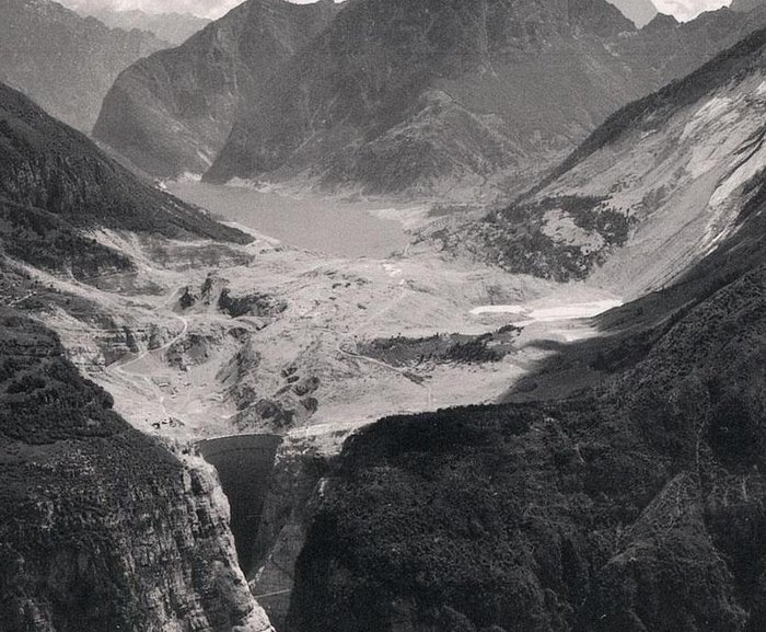 Vajont's reservoir was mostly displaced by a massive landslide, creating a wave that crested 500 feet over the dam's rim.  The dam still stands, but the event permanently removed it from service.