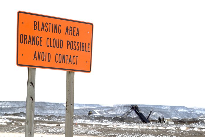 The massive blasting around Wyoming's coal mines prompts many warning signs like this.