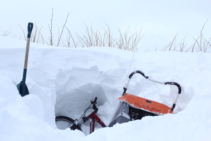 We need a blizzard-proof parking spot!  Left for 2 days, I had to dig my bike out from a drift of head-high snow.