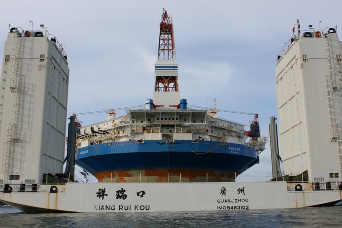 This giant transport vessel can be partially submerged before loading the slightly less giant Kulluk on board.